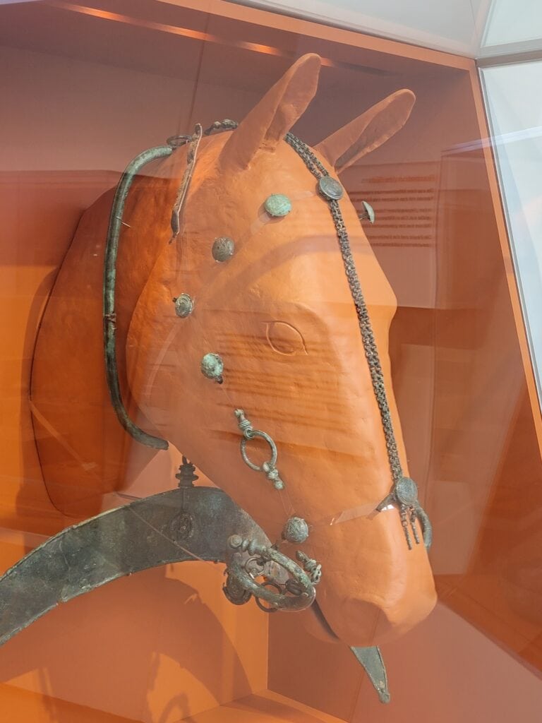 Roman horse armor pieces shown on a model of a horse head at the Rheinisches Landesmuseum in Trier