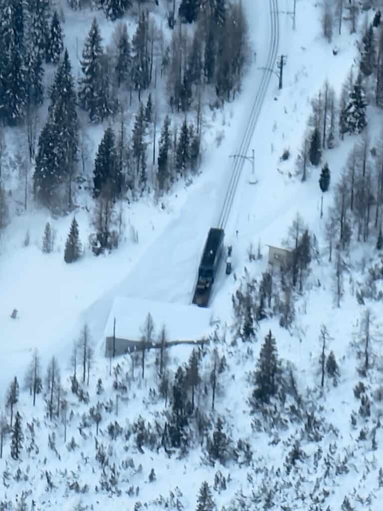 A bird's eye view of the Zugspitze cogwheel train in the snow