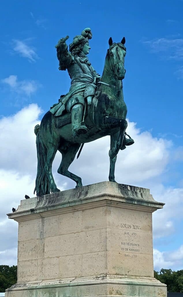Statue of Louis XIV in front of Versailles