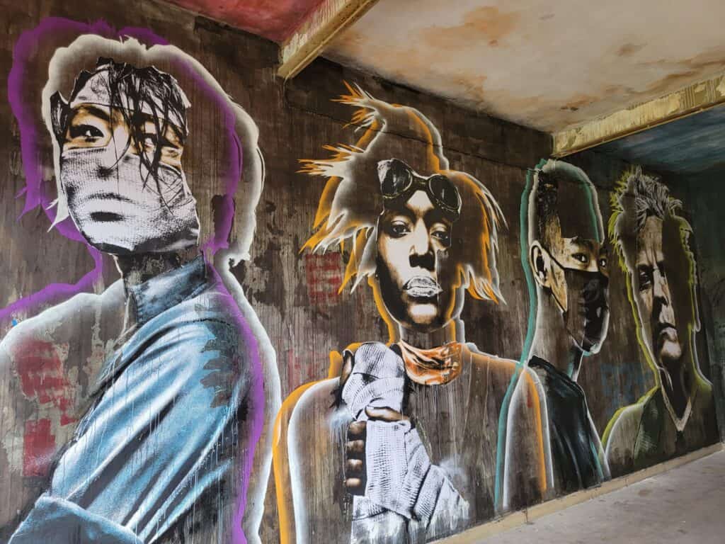 Images of people at the Museum of Urban and Street Art in Bitche, France.