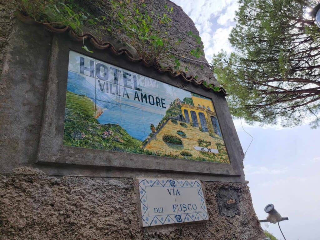 A tiled sign that says Hotel Villa Amore Ravello