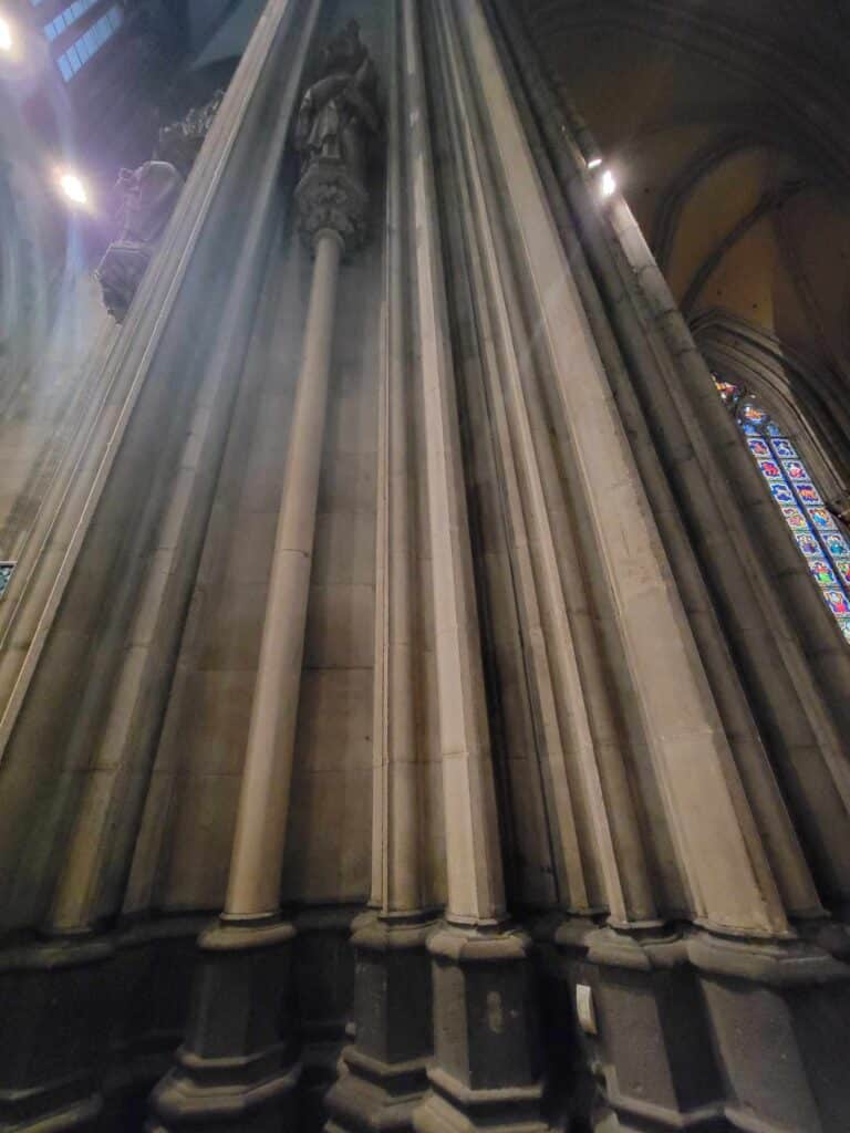 A huge fluted stone column in Cologne Cathedral