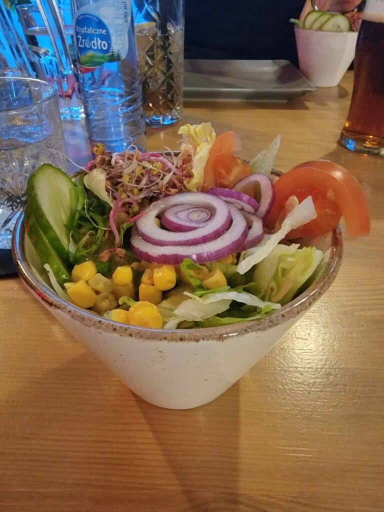 A salad in a bowl, artistically fashioned