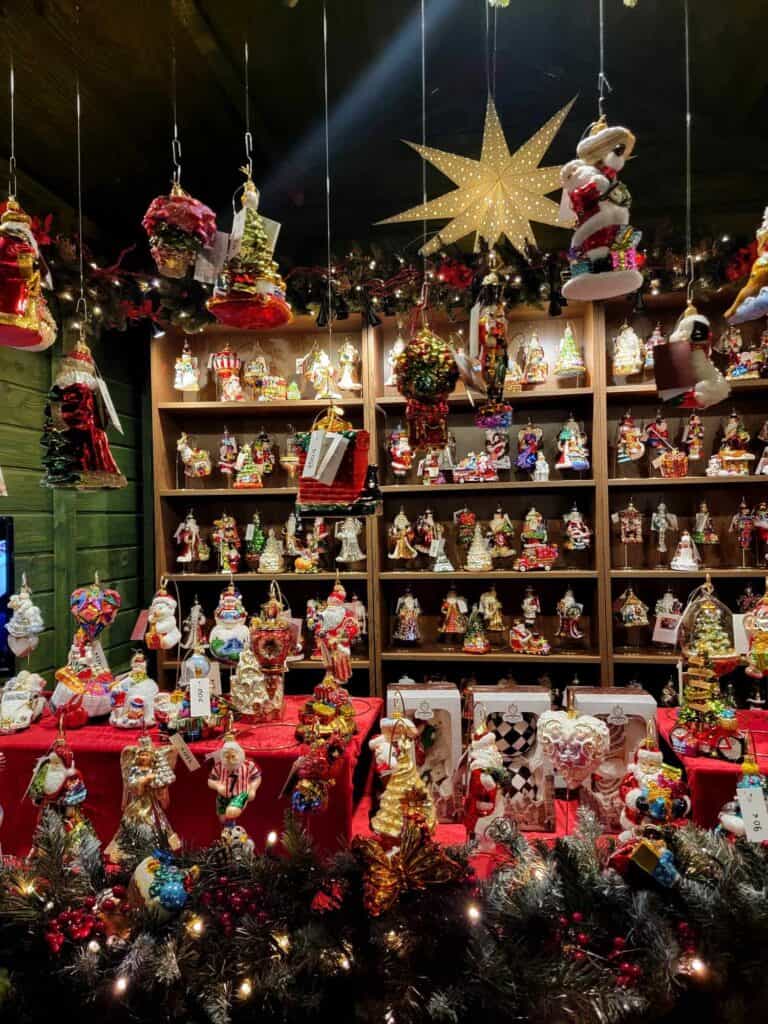 Hanging stars and shelves full of Christmas figureines