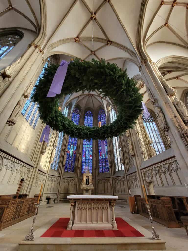 A huge advent wreath, suspended over the altar of a church