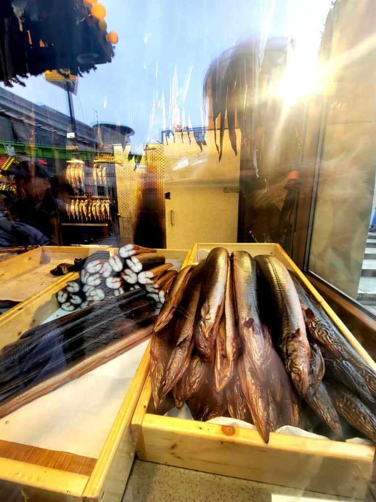 Smoked fish in wooden boxes