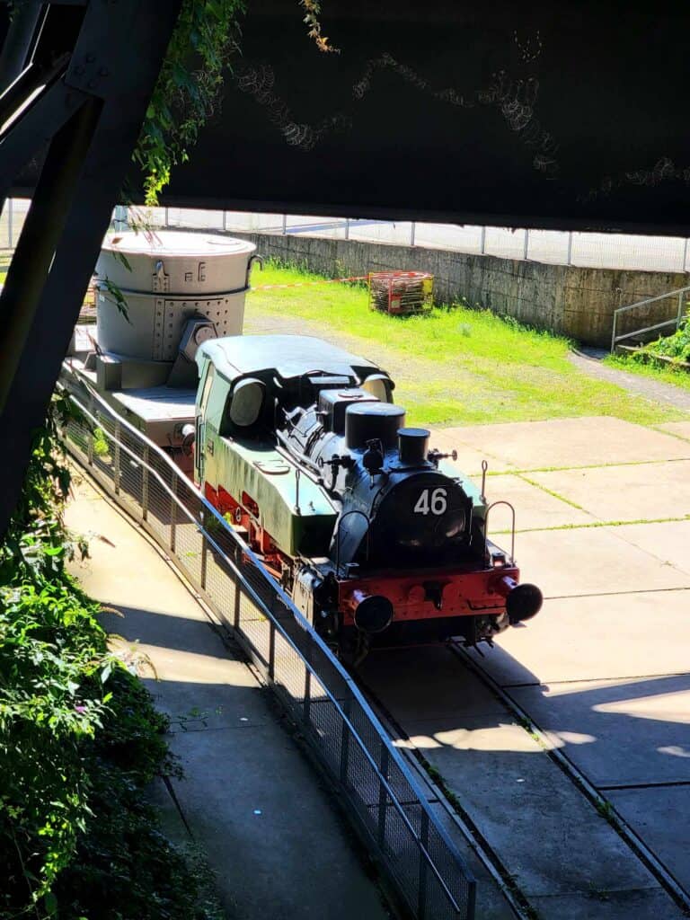 A small train locomotive on a track