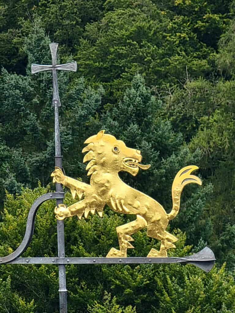 A golden lion on a weathervane