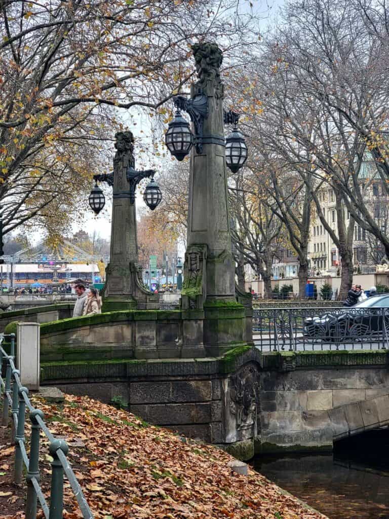 19th century style bridge with hanging lanterns 