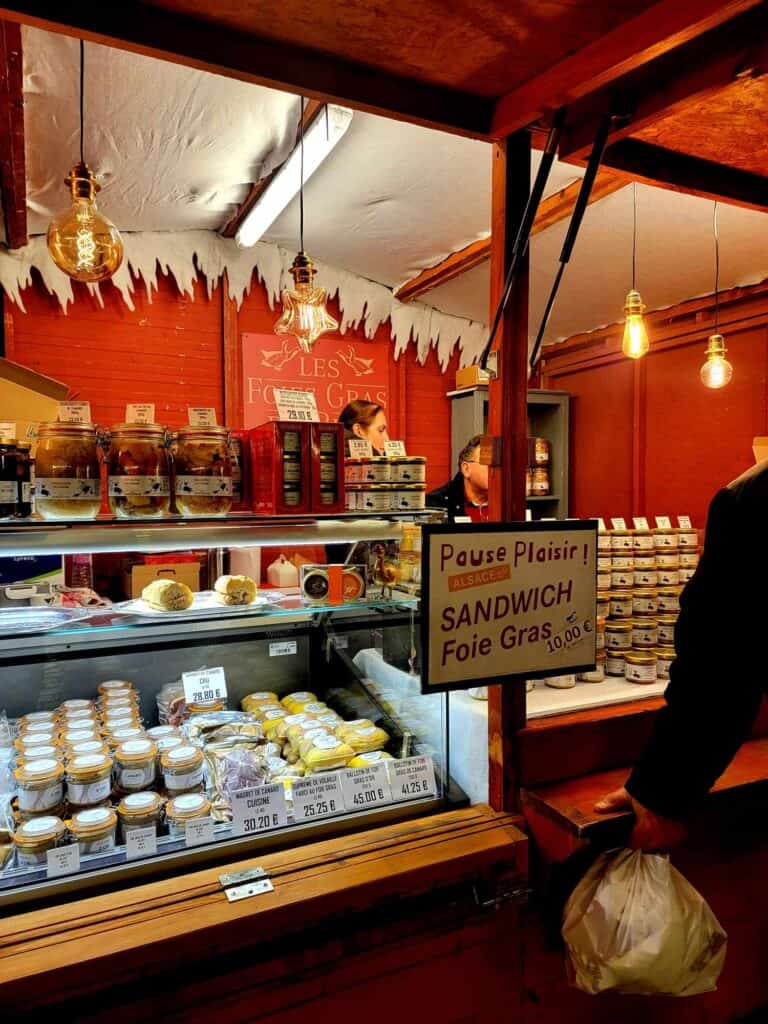 A market stall selling foie gras sandwiches