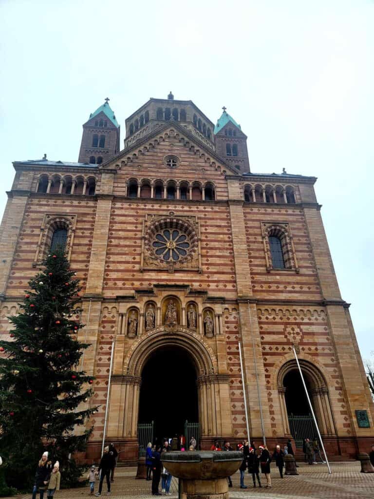 The two-toned red sandstone facade of the Speyer cathedral