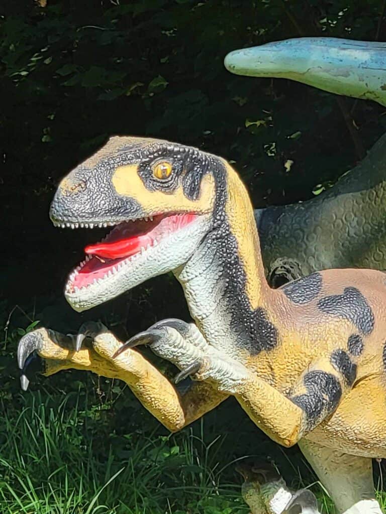 Close up of a velociraptor with claws out