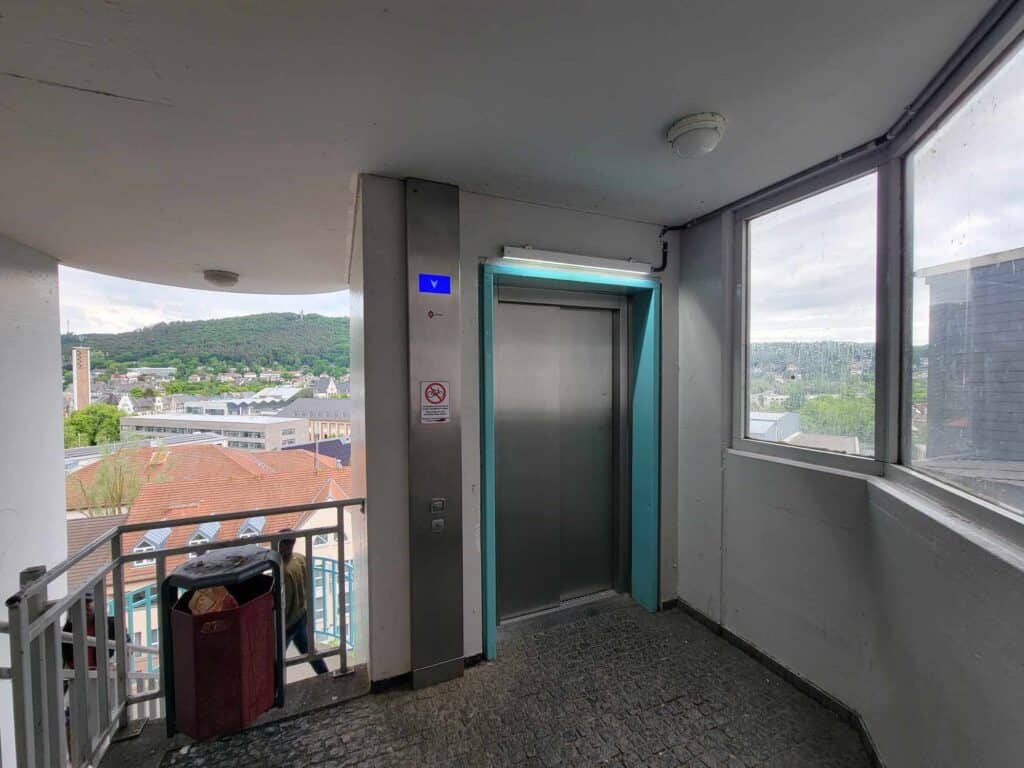 An elevator on a platform overlooking Marburg