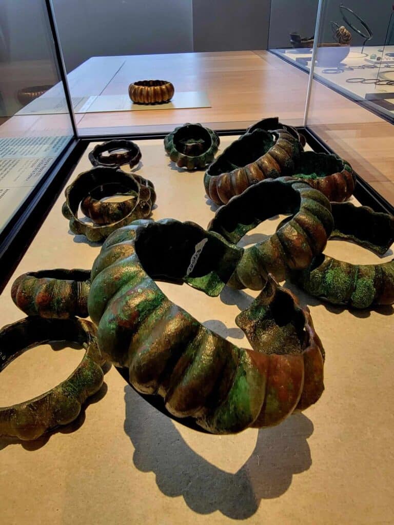 Large bronze Celtic wrist cuffs in a case