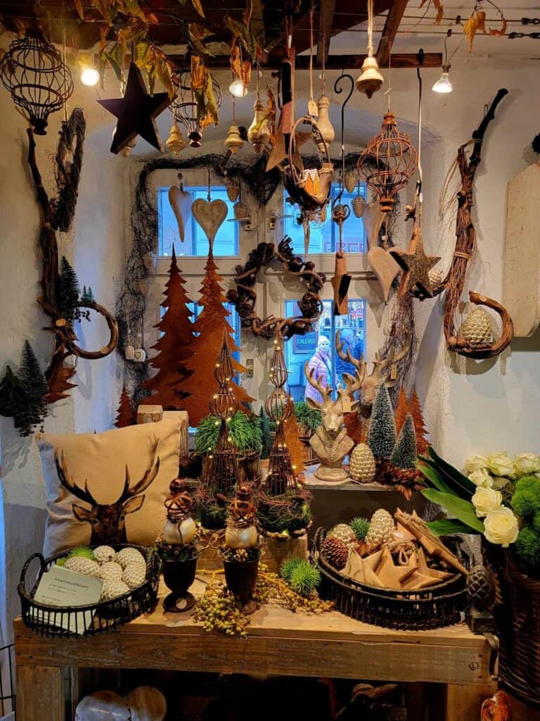 A display of autumn and Christmas woodland themed decor