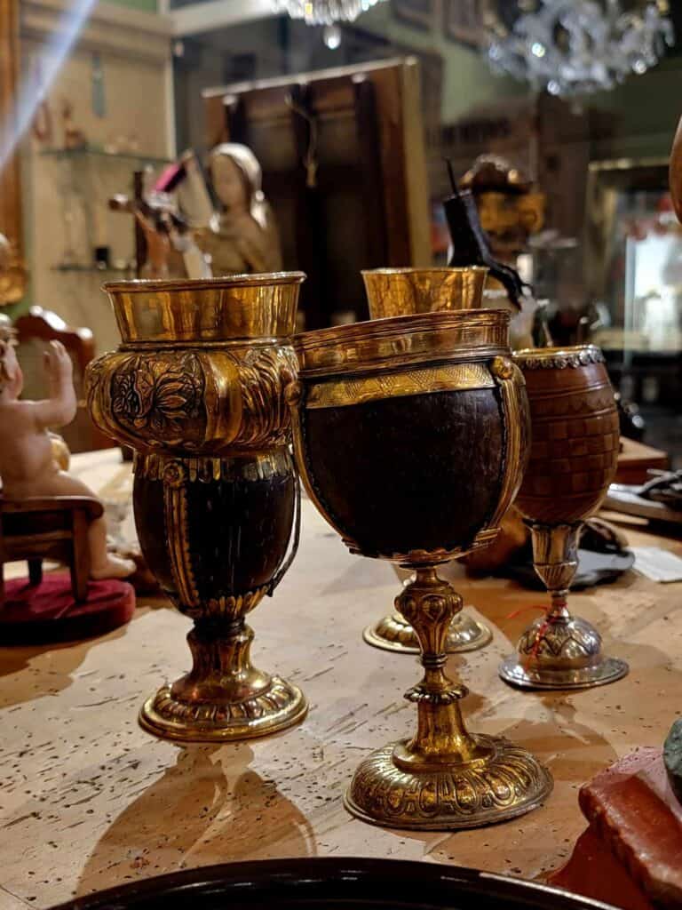 Four Medieval goblets in an antique store