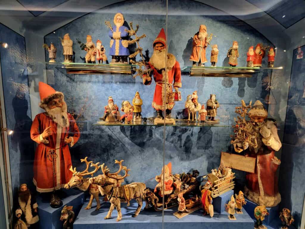 Carved Santas, reindeer, and elves