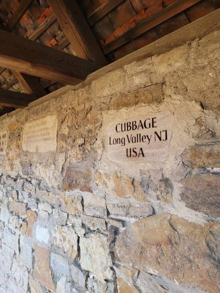 An inscription in a stone wall. Black letters say CUBBAGE, Long Valley NJ USA