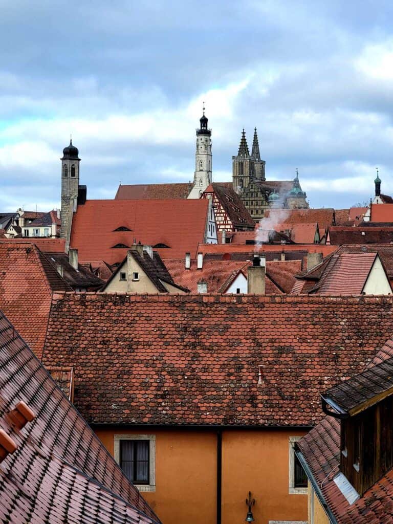 Red tiled rooftops and church steeples in the city of Rothenburg ob der Tauber