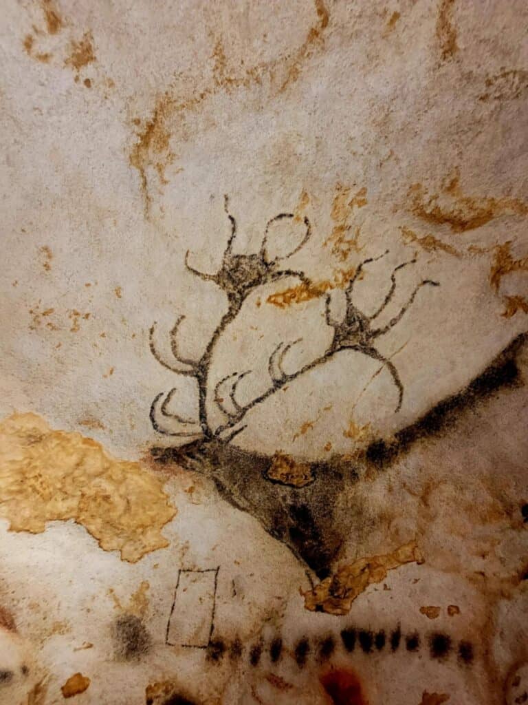 Best 2 Day Dordogne Prehistory Itinerary: What to See & Do 12 A charcoal drawing of a huge elk with elaborate antlers from the side