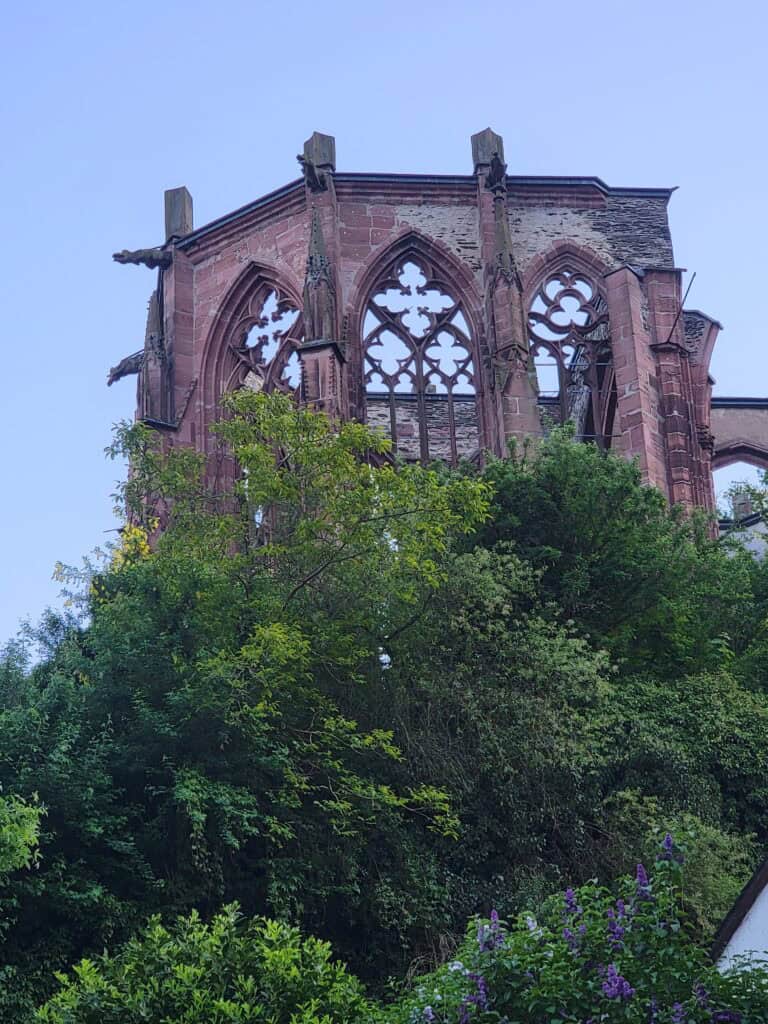 One Day in Bacharach: Best Guide to Germany's Hidden Gem on the Rhine 8 The gothic ruins of Wernerkapelle with gargoyles and red brick, and intricate latticework on the upper windows