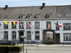 The white flag draped facade of the Wellington Museum in Waterloo Belgium