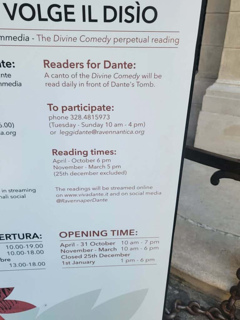 A sign showing how to participate in the nightly reading of the Divine Comedy near Dante's tomb in Ravenna Italy