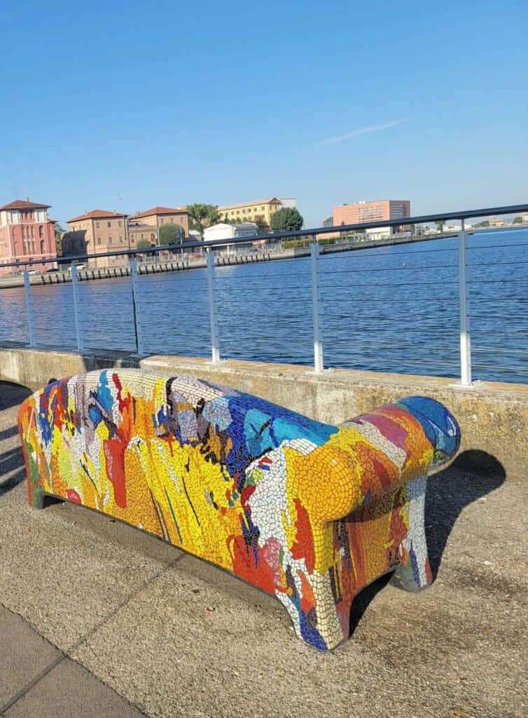 A mosaic sofa looking out over the water in Ravenna Italy