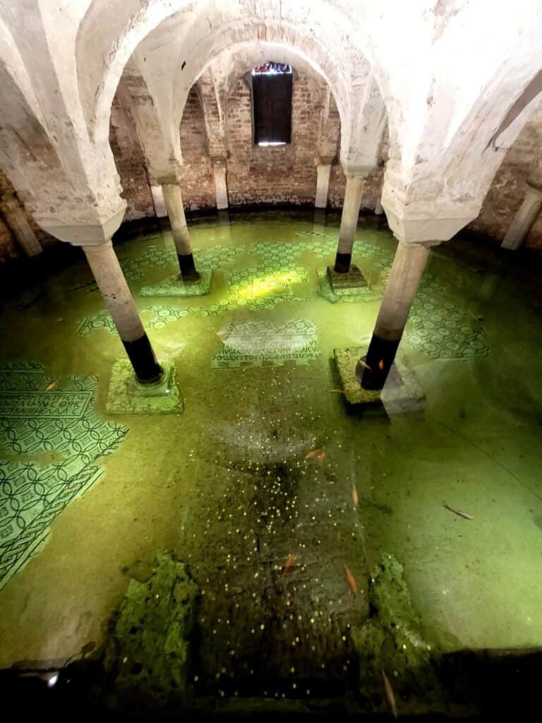 The crypt flooded with water in The Basilica of St. Francesco in Ravenna, Italy