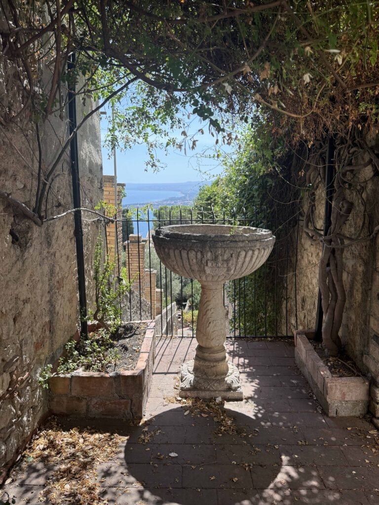 A birdbath on an italian terrace