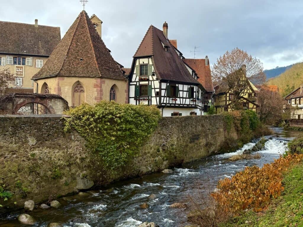 Kaysersberg Christmas Market 2026: Alsace's Most Underrated Hidden Gem 3 Weiss river and buildings in Kaysersberg France