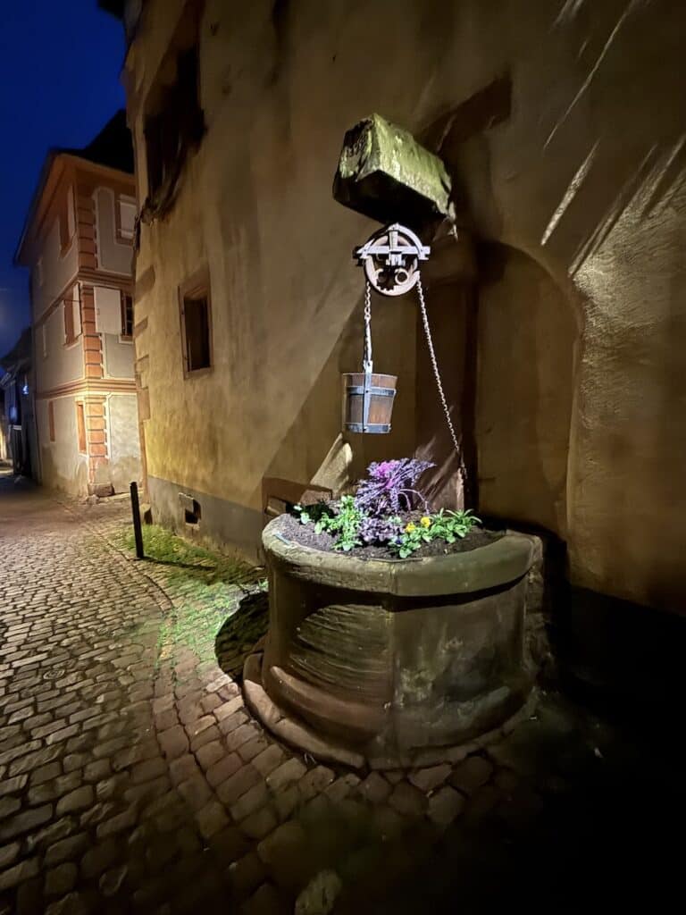Riquewihr Christmas Market 2026: The Most Medieval Market in Alsace 4 An old well in Riquewihr