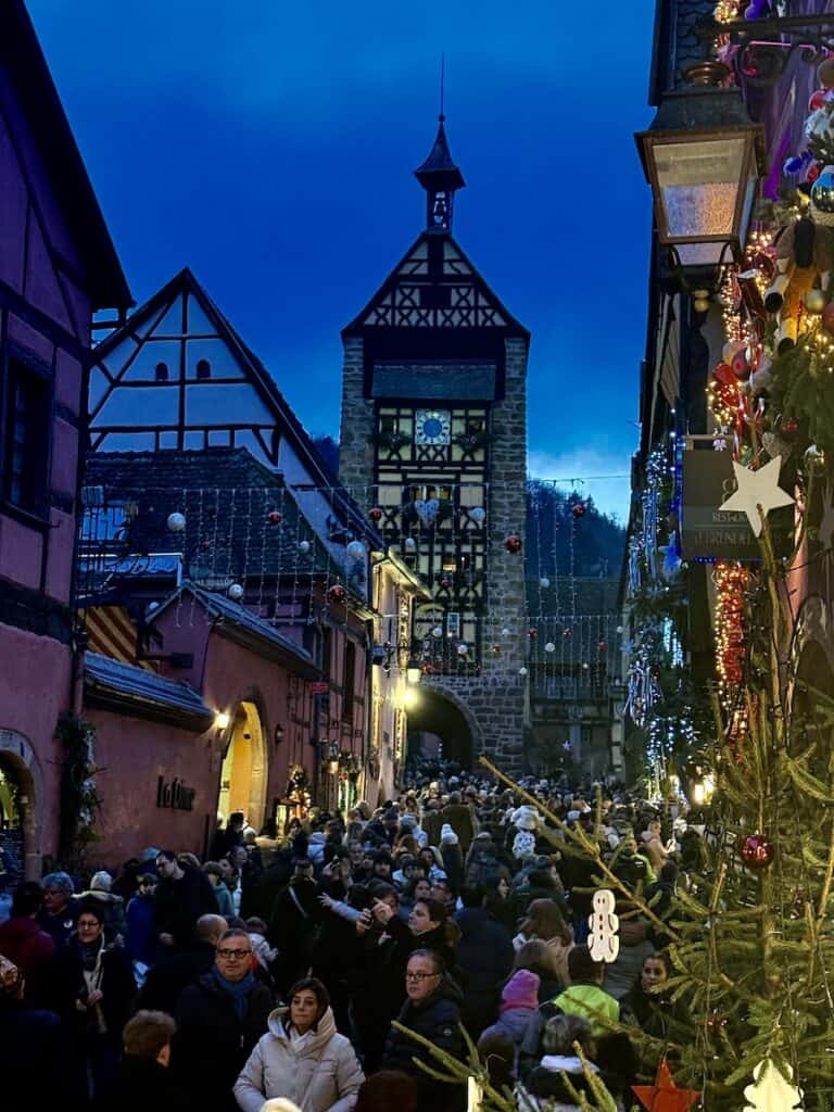 Riquewihr Christmas Market 2026: The Most Medieval Market in Alsace 15 Nighttime weekend crowds at the Riquewihr Christmas market