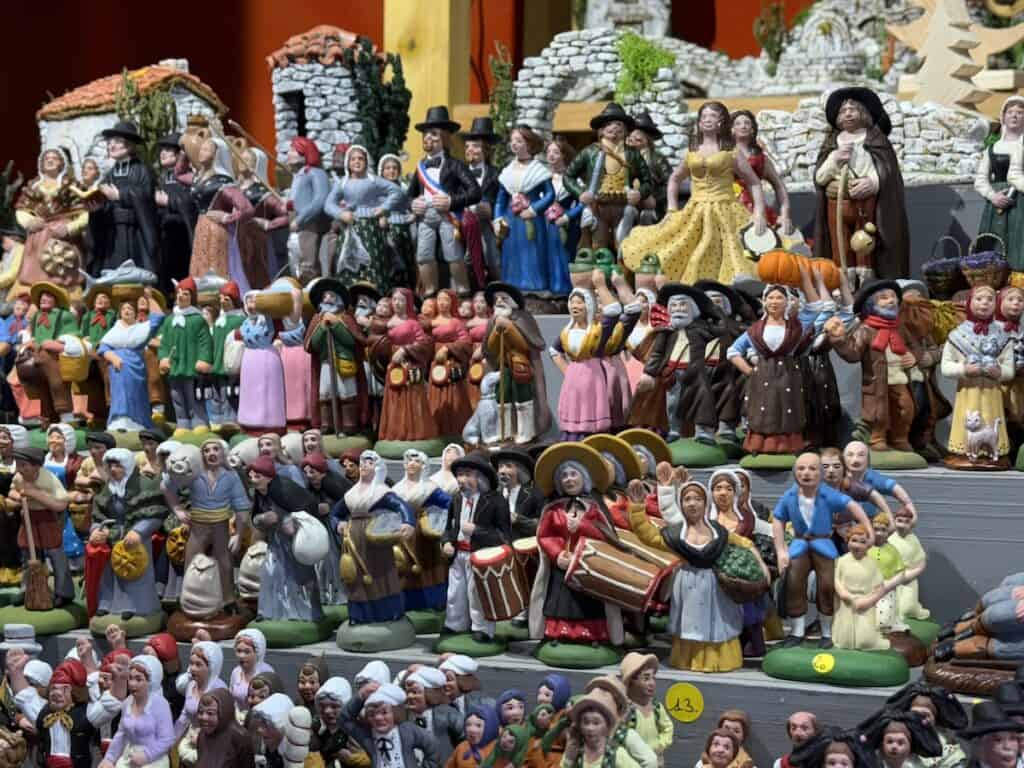 Mulhouse Christmas Market 2026: The Most Elegant Surprise in Alsace 6 Painted Alsacian figurines at the Mulhouse Christmas market