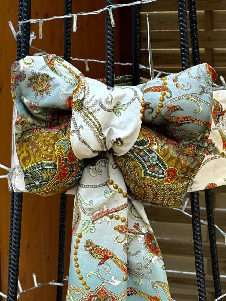 Mulhouse Christmas Market 2026: The Most Elegant Surprise in Alsace 11 A bow made of Christmas fabric at the Mulhouse Christmas market