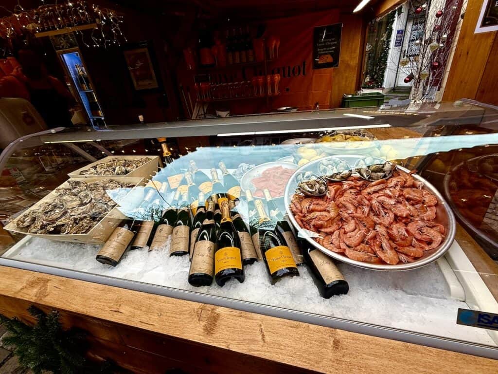 Mulhouse Christmas Market 2026: The Most Elegant Surprise in Alsace 4 Seafood and champagne at the Mulhouse Christmas market