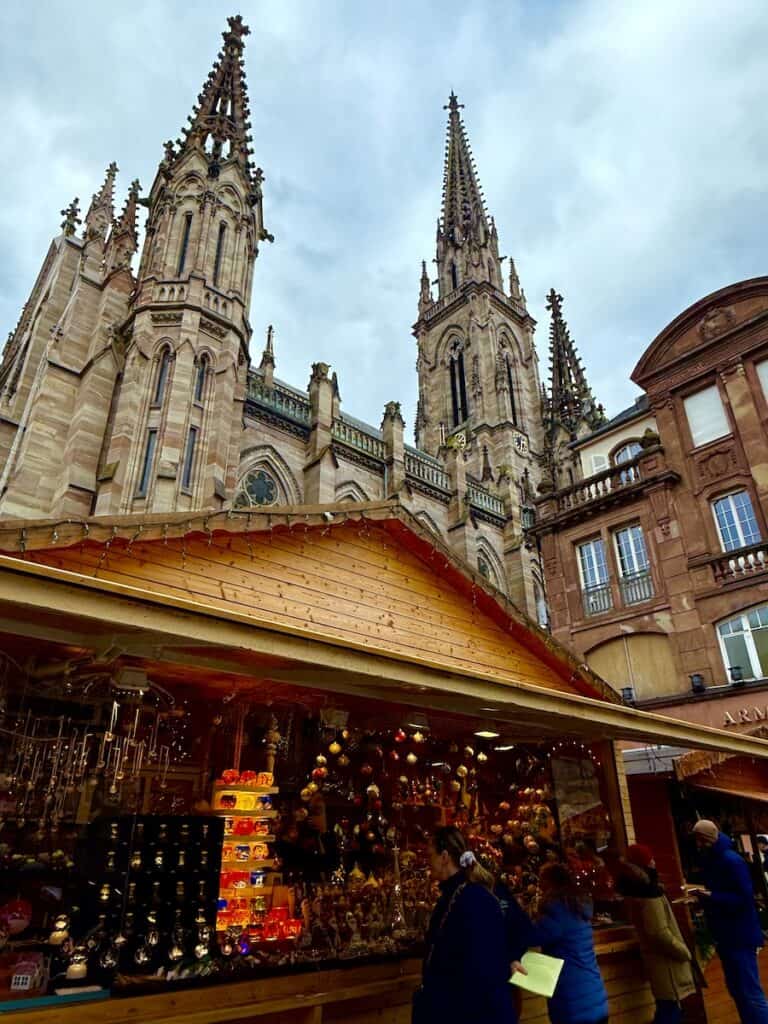Mulhouse Christmas Market 2026: The Most Elegant Surprise in Alsace 7 Mulhouse Christmas market with Temple of Saint Etienne and craft stalls