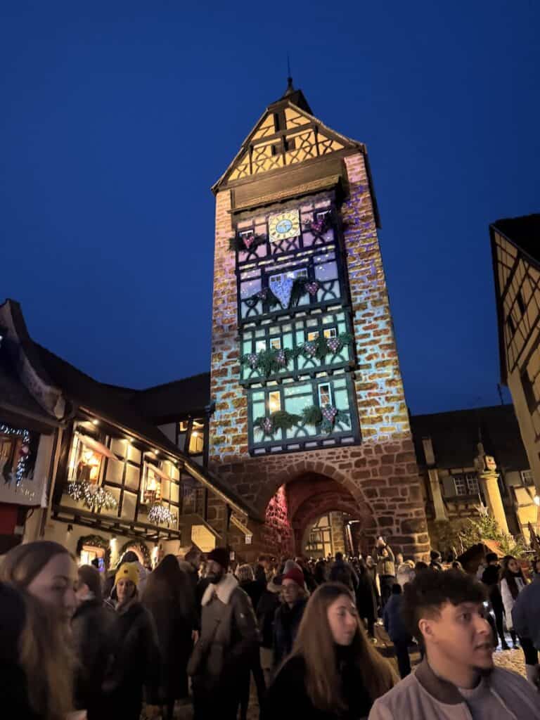Riquewihr Christmas Market 2026: The Most Medieval Market in Alsace 16 The Dolder tower at night during the Riquewihr Christmas market