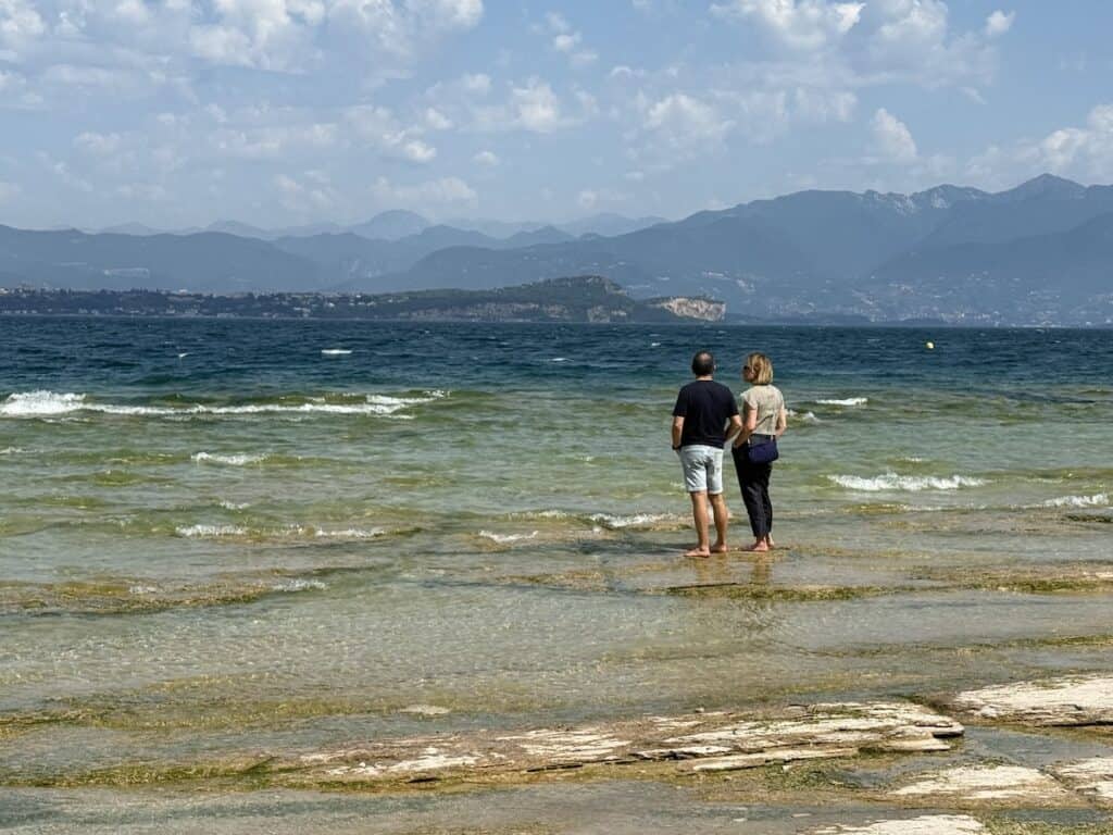 Lake Garda from Verona: Why Sirmione is the Best Day Trip 12 A couple at Jamaica Beach in Sirmione