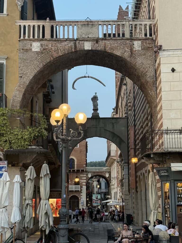 Things to Do in Verona: A 4-Day Guide Beyond Romeo and Juliet 2 A whale bone hanging from an arch in Verona Italy