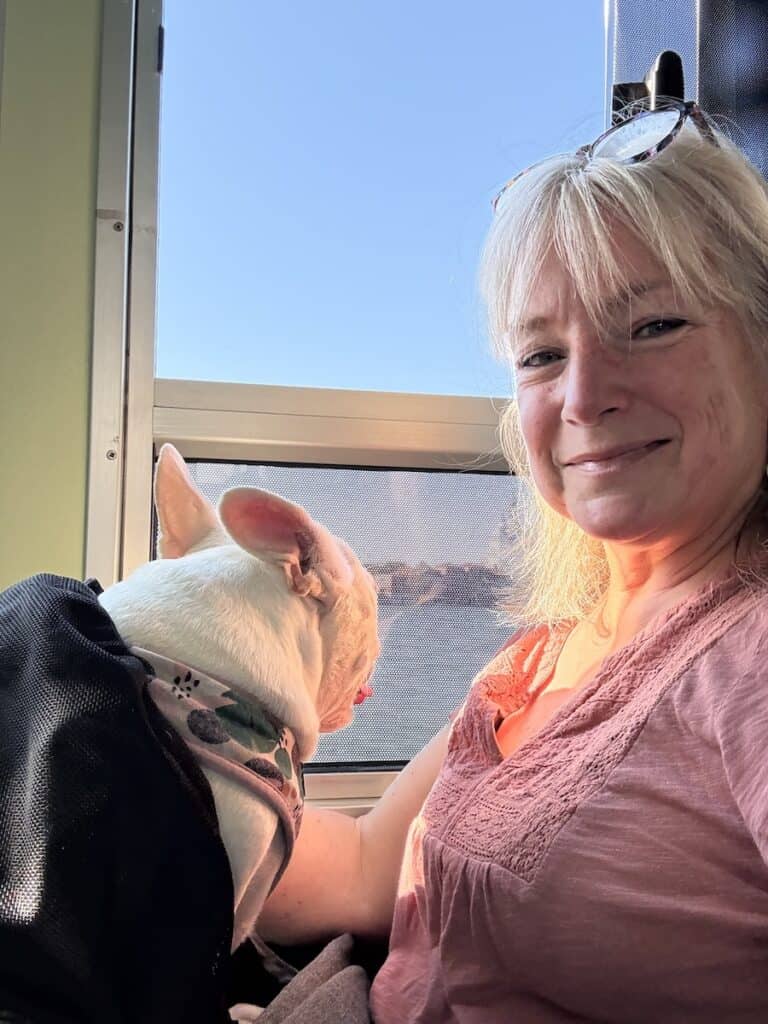 Are Dogs Allowed in Venice? Taking Our Dog by Vaporetto and Water Taxi 7 Woman and french bulldog on vaporetto