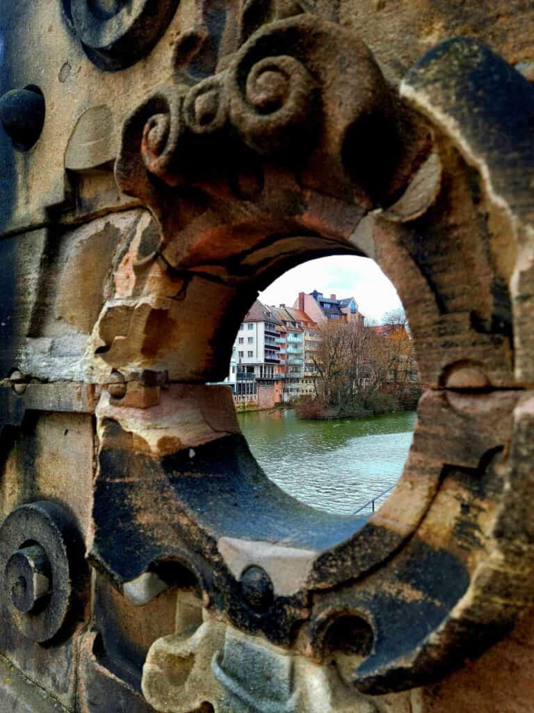 Is Nuremberg Worth Visiting? My Answer in 2026 4 View from a carved stone bridge of the River Pegnitz