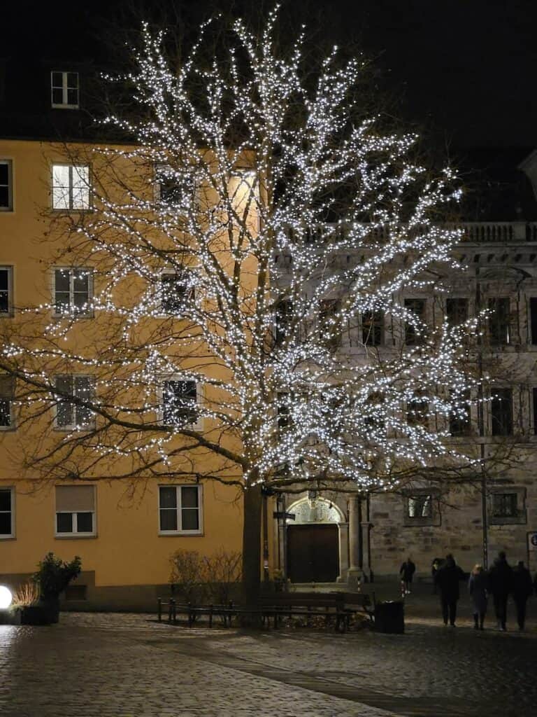 Best Time to Visit Nuremberg Germany: A Season-by-Season Guide (2026) 4 Illuminated tree near St. Sebaldus Church in Nuremberg
