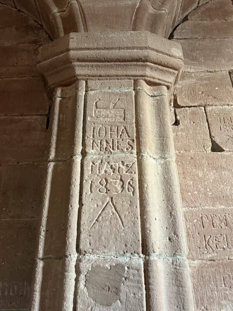 Burg Trifels: Is it Worth the Climb? 6 Carving on a stone wall in Burg Trifels that reads Johannes Matz 1836